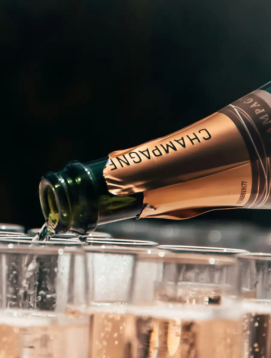 free champagne being enjoyed by watering hole bar clients